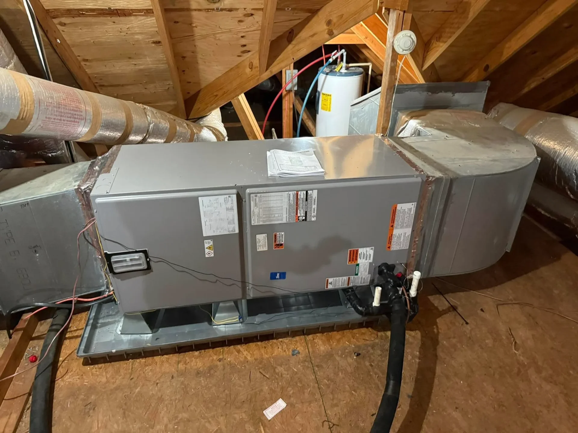 Air handler and ductwork installation in attic