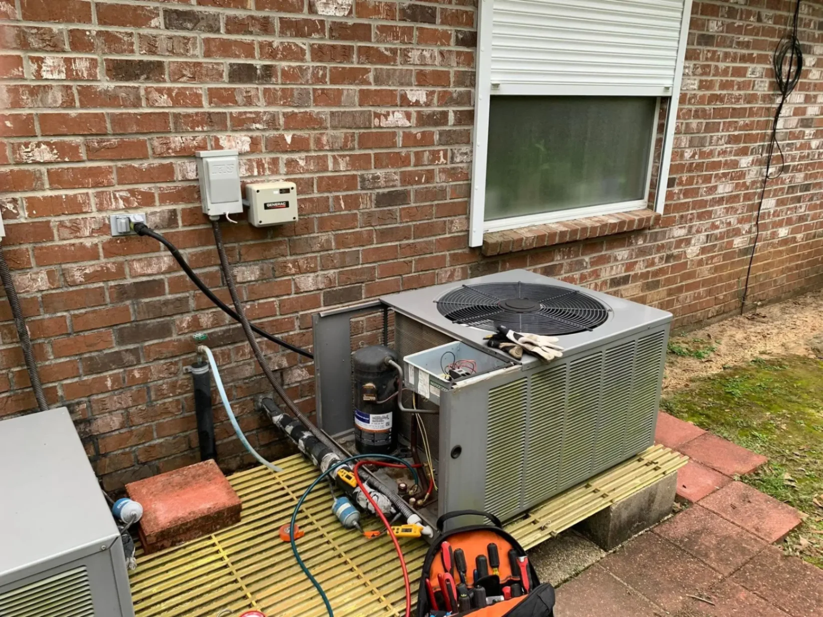 Open AC condenser during repair in Hammond, LA